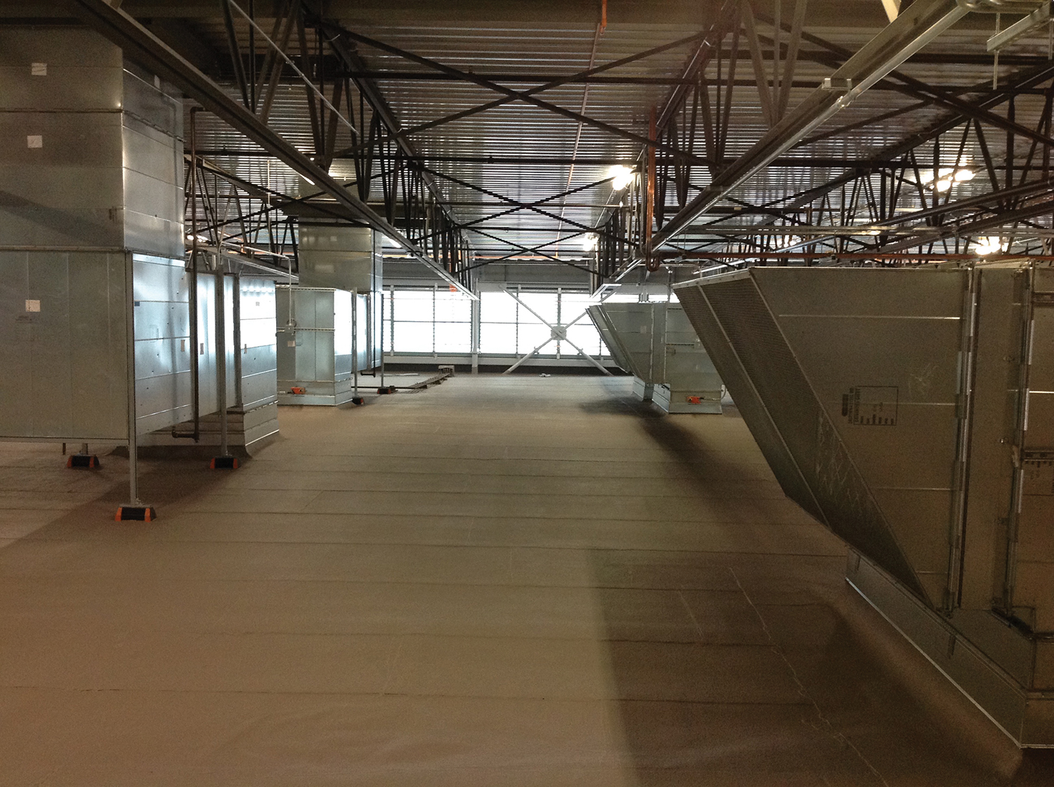 Figure 7. Ductwork was the last stage in bringing the second floor economizer on line.